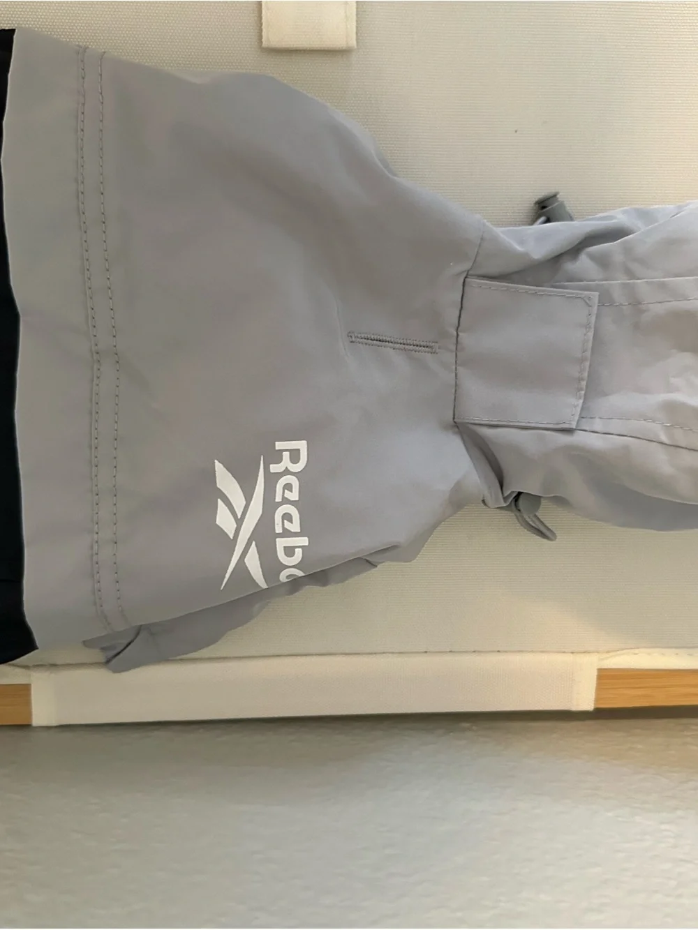 Reebok dog’s Gray and Black rain Jacket
